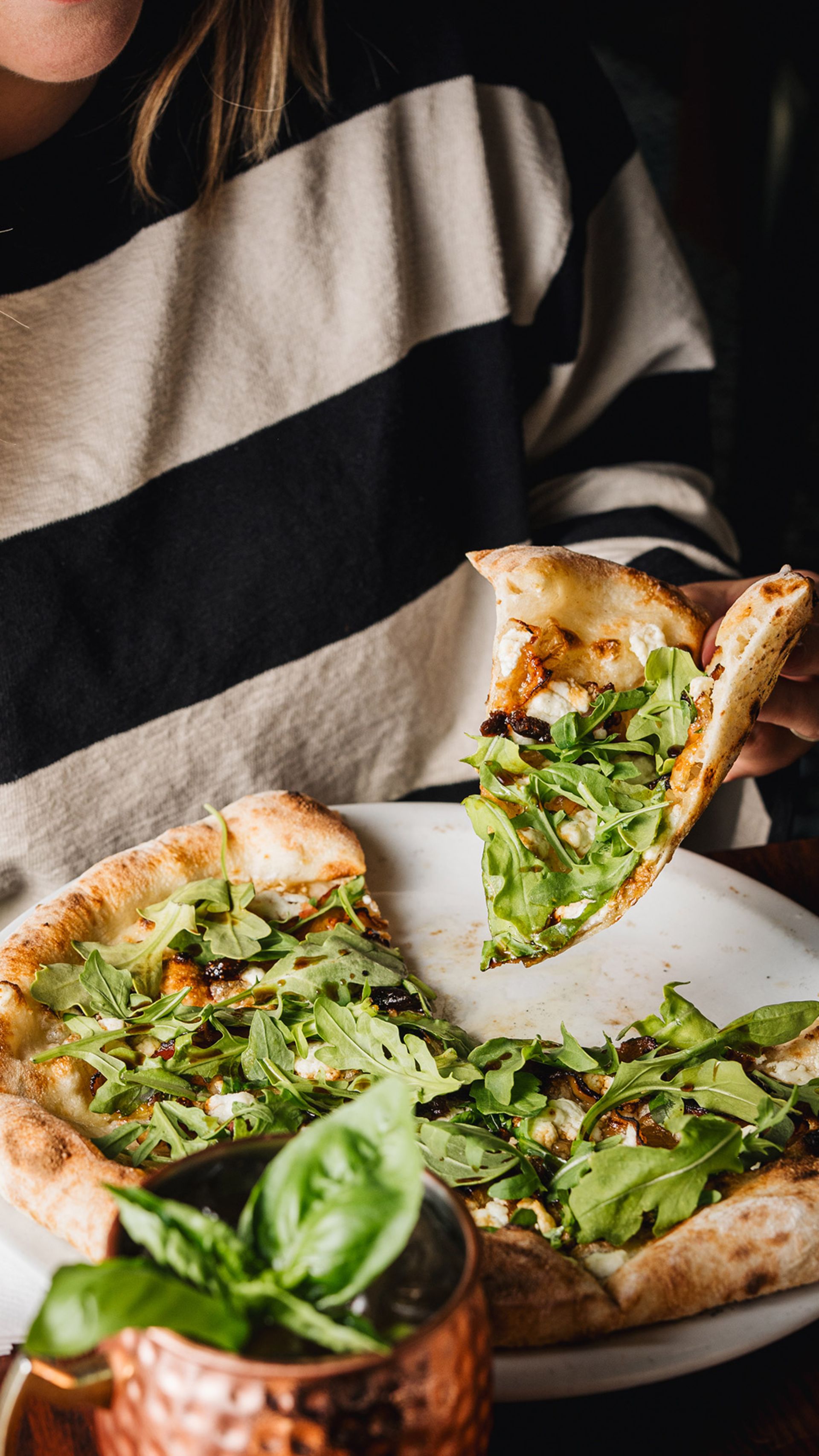 Pizzas, salads, chili oil, and cocktails